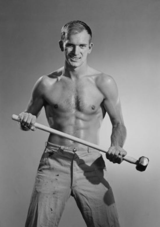 Portrait of a young muscular man holding a hammer poster print.