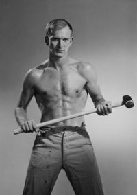 Portrait of a young muscular man holding a hammer poster print.