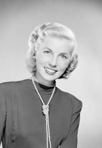 Studio portrait of a young woman smiling poster print