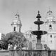 Beautiful Peru fountain poster print featuring a colonial church backdrop.