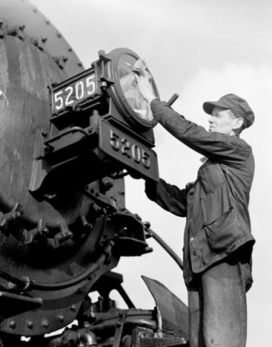 Male Worker Cleaning Train Headlight Poster Print showcasing vintage industry theme.
