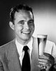 Portrait of a mid adult man holding a glass of beer poster print