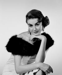 Studio portrait of young woman in elegant clothes poster print.