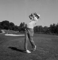 Man Playing Golf Poster Print showcasing a golfer in action.
