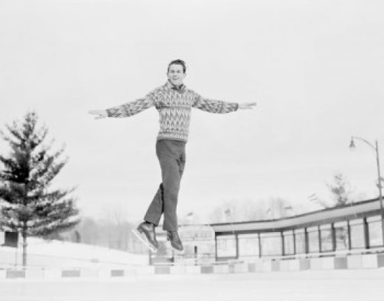 Dynamic ice skater poster print featuring a man jumping while ice skating.