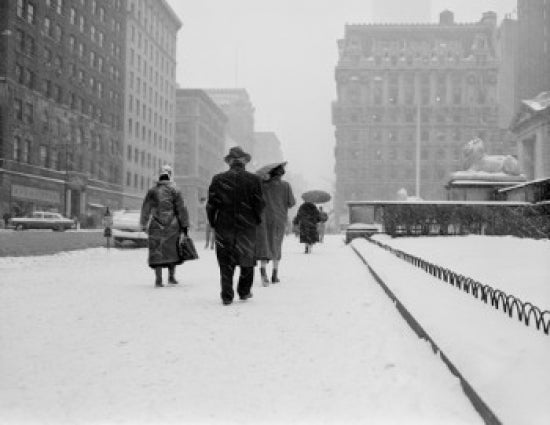 New York City Fifth Avenue snowy scene poster print featuring people walking in front of the New York Public Library.