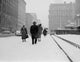 New York City Fifth Avenue snowy scene poster print featuring people walking in front of the New York Public Library.