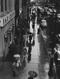 Rainy Day on 42nd Street Poster Print showcasing New York City
