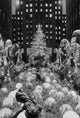 1956 Christmas in New York City poster print featuring Plaza Hotel and Radio City.