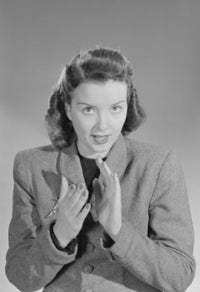 Portrait of a mid adult woman gesturing poster print