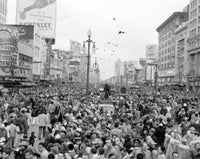 Mardi Gras crowd on Canal Street poster print showcasing festive celebration in New Orleans.