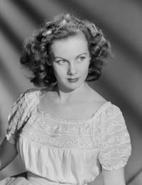 Studio portrait of a young woman smiling, available as a poster print.