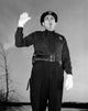 Police Officer Low Angle View Poster Print showcasing bravery and commitment