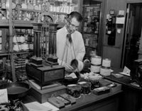 Chemist at Work Poster Print showcasing scientific exploration.
