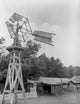 Wisconsin Farm of the Pioneers Windmill Poster Print showcasing a picturesque windmill and rural landscape.