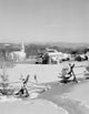 Winter farm and church poster print in Peacham, Vermont