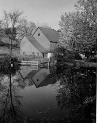 Vermont Farmhouse by Pond Poster Print showcasing serene countryside.