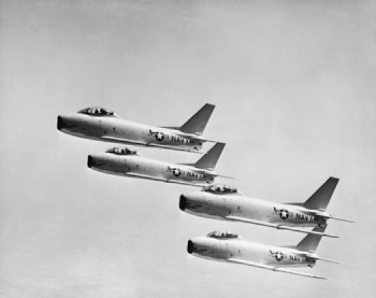 Poster print of four military planes flying in formation.