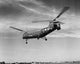 H-21D Helicopter in flight poster print showcasing military aviation.