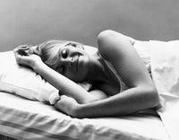 Young woman sleeping and smiling poster print