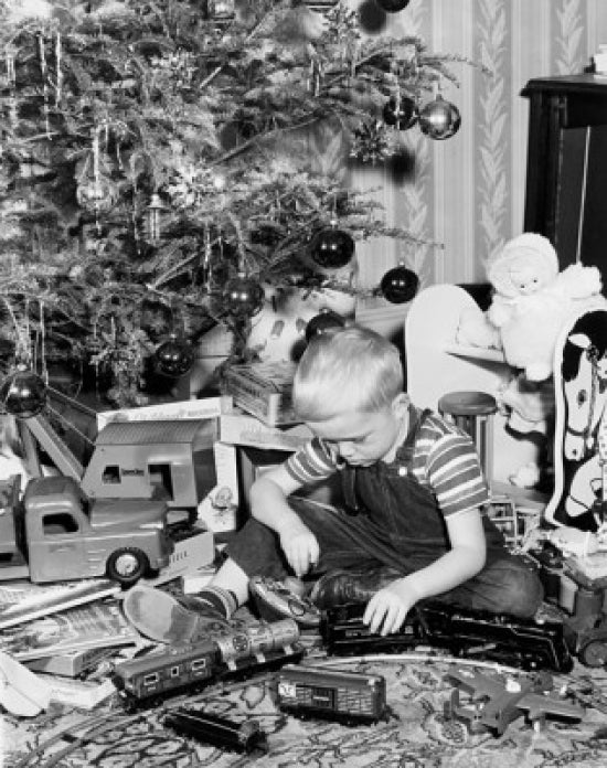 Boy Playing with a Toy Train Poster Print