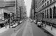 Buildings along a road in Chicago, Illinois poster print