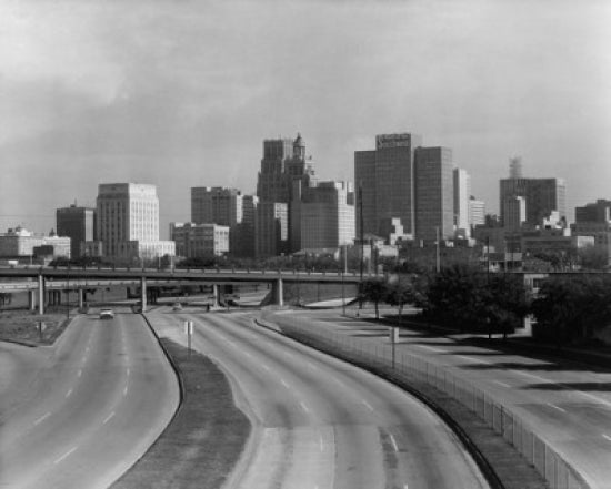 High angle view of a Houston highway with skyscrapers in background