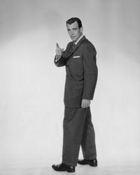 Side profile of businessman pointing forward poster print