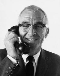 Senior businessman talking on telephone poster print