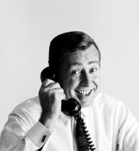 Close-up of a businessman talking on the telephone poster print