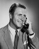 Close-up poster print of businessman talking on the telephone