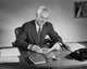 Businessman Writing a Letter Poster Print showcasing professionalism and creativity.