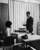 Poster print of side profile businessman dictating letter to secretary, perfect for office decor.