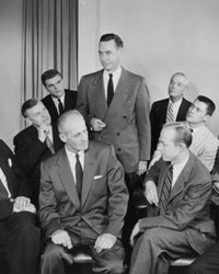 Business Executives in Meeting Poster Print showcasing professionalism and teamwork.