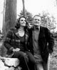 Portrait of a mature couple enjoying time in their backyard, poster print.