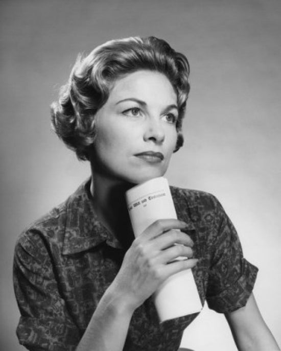 Studio portrait of a mid adult woman poster print