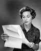 Studio Shot of Woman Reading Plan Poster Print