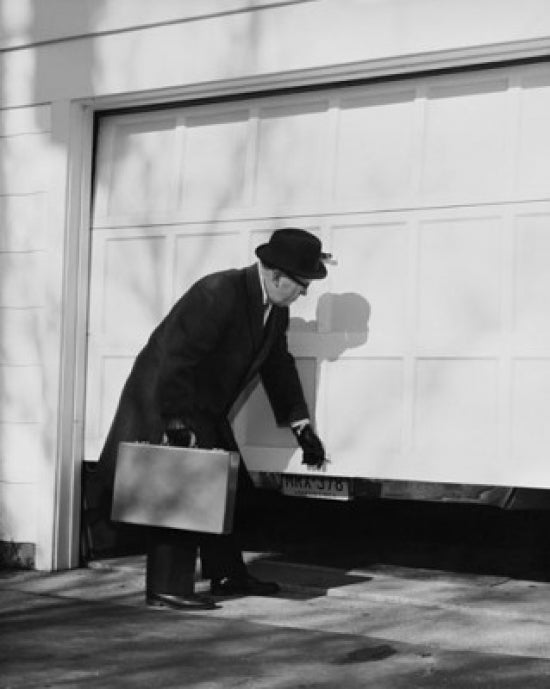 Businessman Opening a Garage Door Poster Print showcasing ambition and determination.