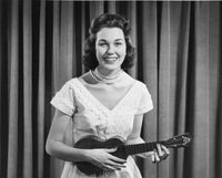 Portrait of Young Woman Playing Ukulele Poster Print