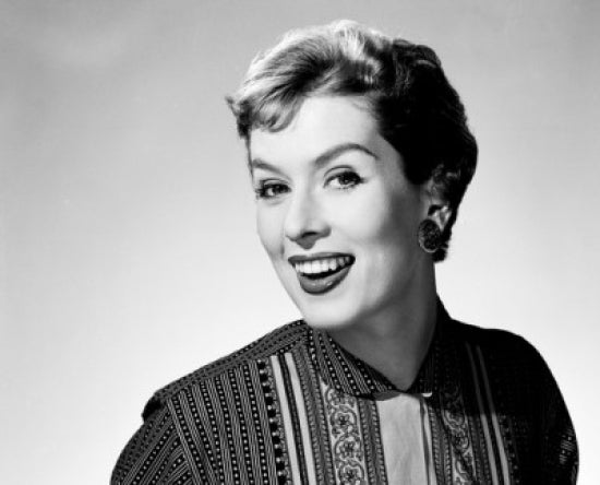 Studio portrait of a mid-adult woman poster print