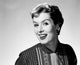 Studio portrait of a mid-adult woman poster print