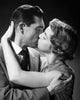 Close-up poster print of a young couple kissing, capturing a romantic moment.