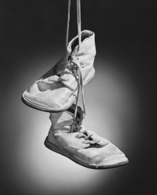 Close-Up of a Pair of Shoes Poster Print showcasing intricate shoe details.