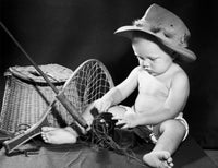 Close-up of a baby with fishing gear poster print