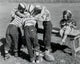 Boys in a Huddle Poster Print showcasing teamwork and sportsmanship.
