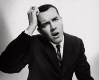 Close-up of a confused businessman poster print, perfect for office decor.