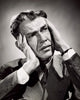 Close-up of a businessman suffering from a headache poster print.