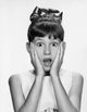 Portrait of a girl looking surprised poster print