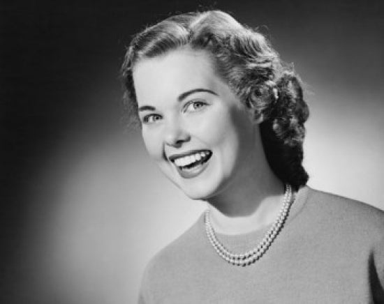 Portrait of a young woman smiling poster print, vibrant colors, high-quality paper.