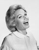 Portrait of a Mature Woman Laughing Poster Print